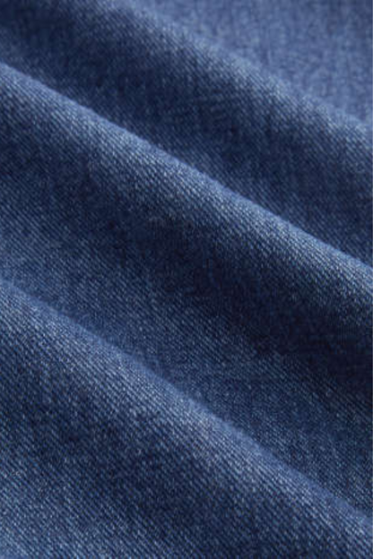 Mono vaquero de pierna ancha con cuello en V